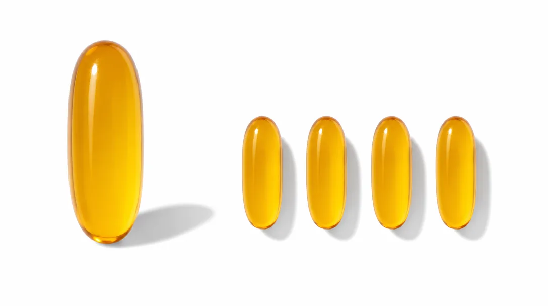 Generic render: one large softgel beside four small ones